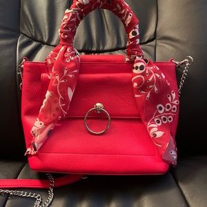 Talbots red purse. Never used. Can use hand handles or shoulder strap.